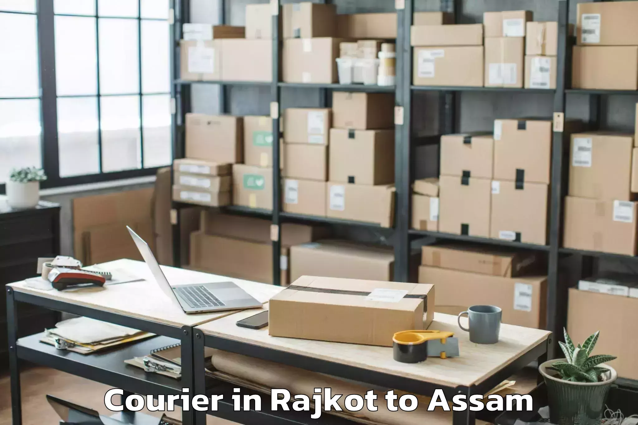 Efficient Rajkot to Mikirbheta Courier